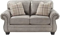 Signature Design By Ashley Olsberg Faux Leather Loveseat With Nailhead Trim And 2 Accent Pillows, Gray & Olsberg Faux Leather Ottoman With Nailhead Trim, Gray -Amazon Store 41nMeTmY6L. AC