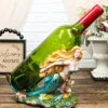 Ebros Nautical Coastal Beach Colorful Blonde Mermaid With Shimmering Blue Tail Swimming By Corals Wine Holder Display Figurine Resin Sea Siren Kitchen Decor Party Centerpiece Ocean Reef Nymph Statue